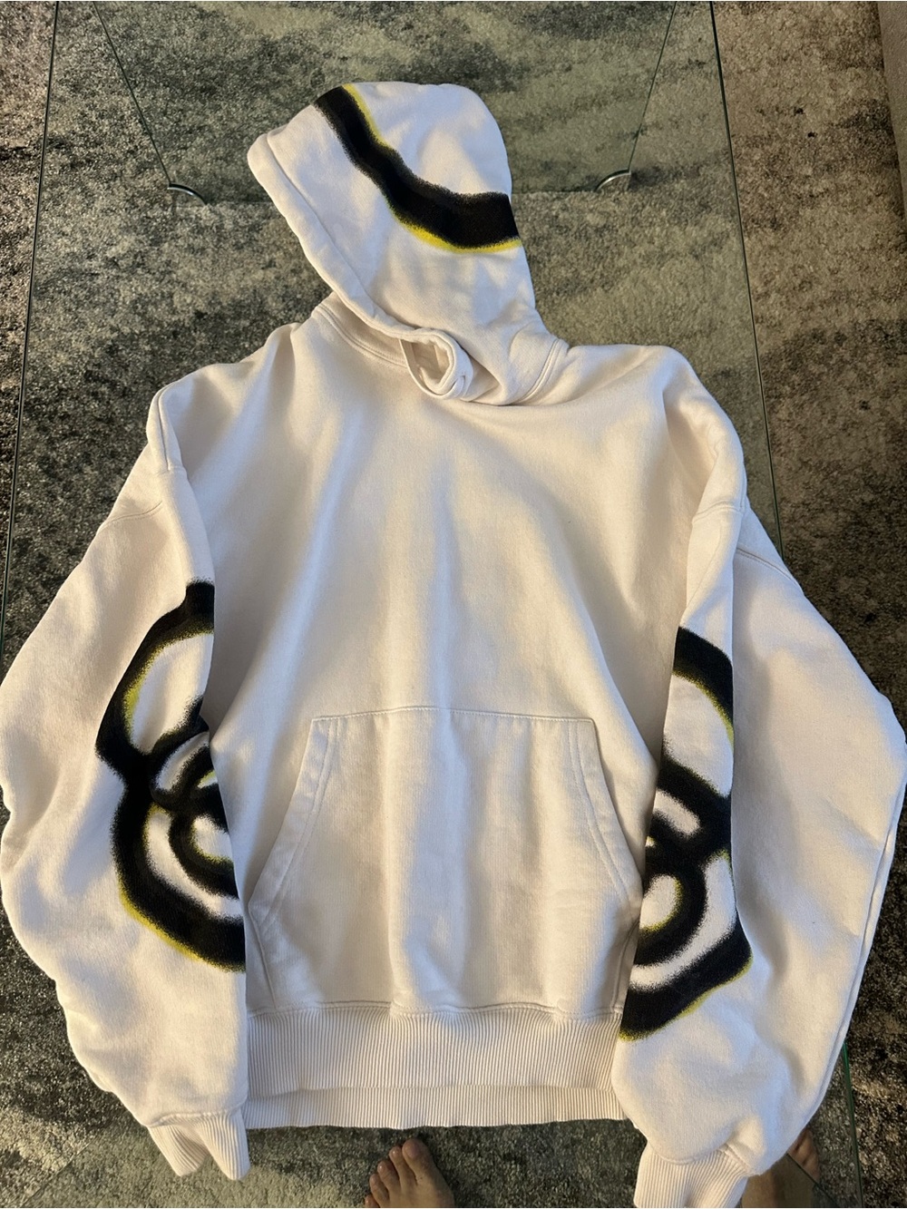 Zara White Hoodie with Black and Yellow Spray Graphic